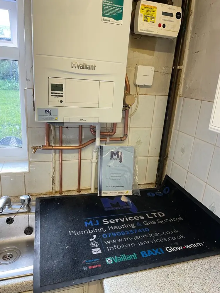Gas boiler with paperwork after a safety check