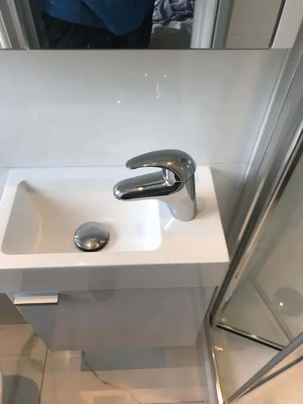 New basin mixer tap on a compact vanity unit